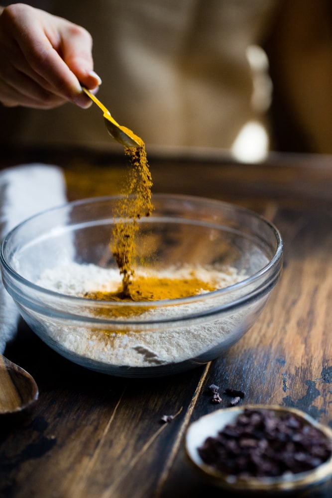 An image of some spices being mixed